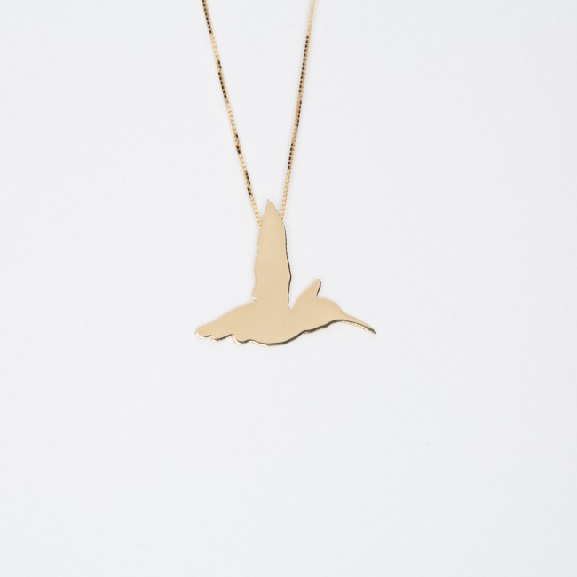 Charm with hummingbird