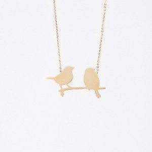 Necklace with two birds on a branch