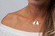 Necklace with two birds on a branch