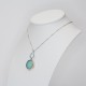 Charm in white gold and turquoise